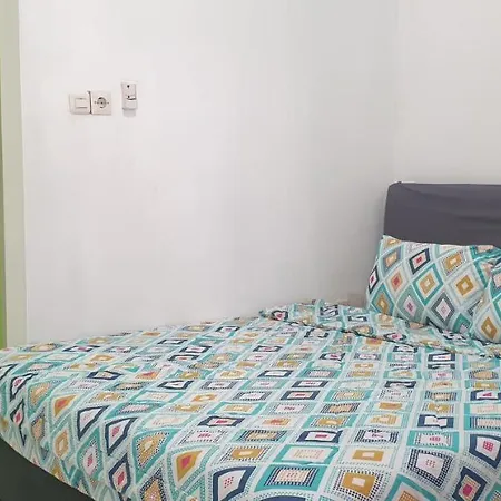 Oyo 90990 Surya Residence